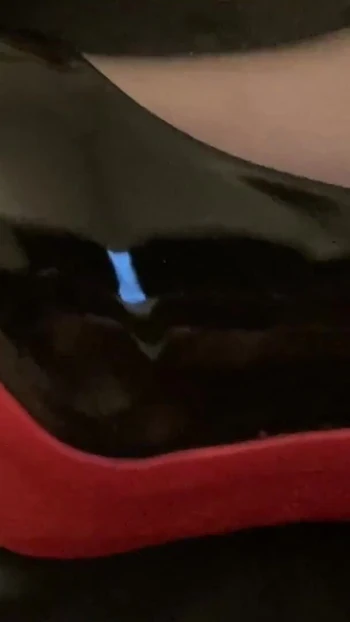 Iconic moment from "Blue Vinyl Leggins, Nylons, High Heel Pumps"