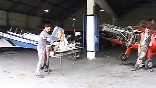 Workers with hard cock fucking the ass of a sexy blonde in black stockings