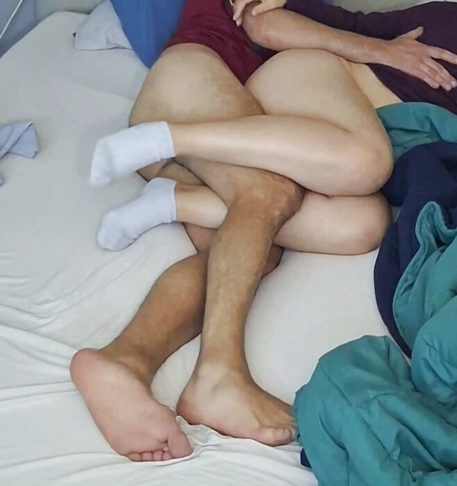 Fucking her pussy while she watches tv