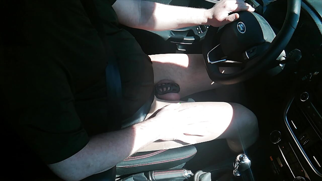 Small Penis in Cage While Driving in Pantyhose