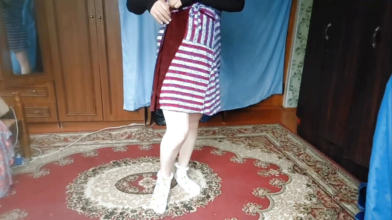 Soft sissy twirling skirt in cozy warm bedroom