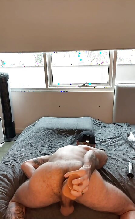 Hunk Fucking Dildo in Multiple Positions