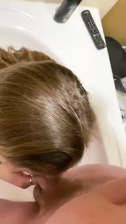 Cute piss slut gets golden shower and gives blowjob