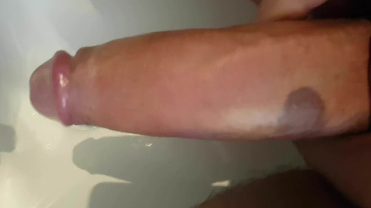 Foreskin strocking cumshot