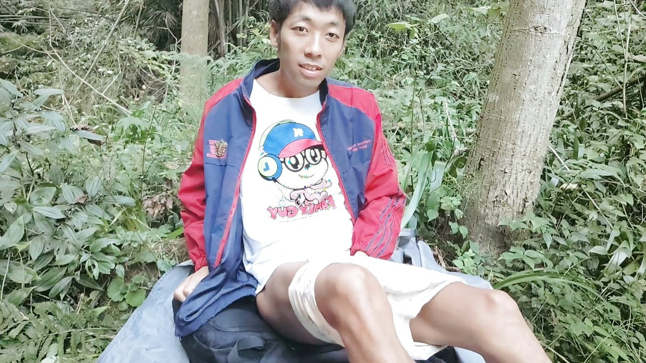 Asian male masturbates in the deep mountains and jungles, moaning and ejaculating, swallowing the liquid