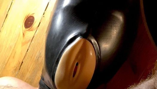 Latex Mask Filled with Sperm From His Cock!