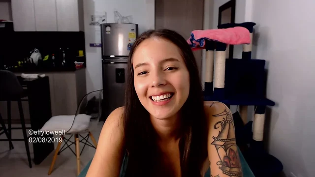 Sexy tattooed girl with the face of a good girl misbehaves on her webcam show while she masturbates