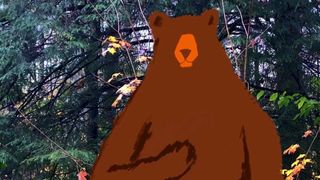 树林里的一只裸体熊。真人秀和卡通。