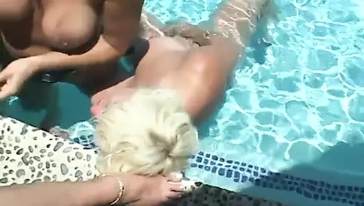 Two horny lesbians on the floor fuck eachother with two way dildo