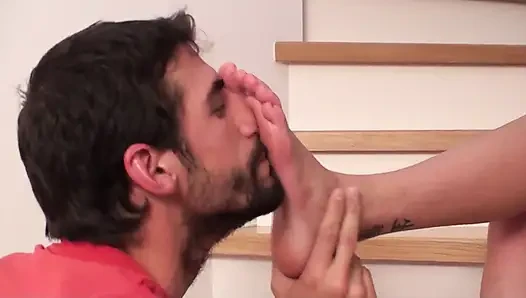 Feet smelling of sweet babe on staircase