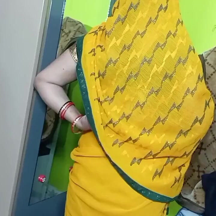 Indian Beautiful Bhabhi in Yellow Color Sari.