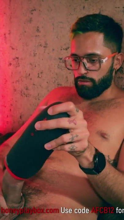 Stunning moment from "Big Cock Latino Camilo Brown Testing Honeyplaybox Dayo Vibrating, Heating and Clamping Masturbator"