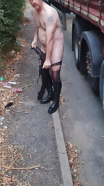 Cock locked sissy sucking dildo outdoors