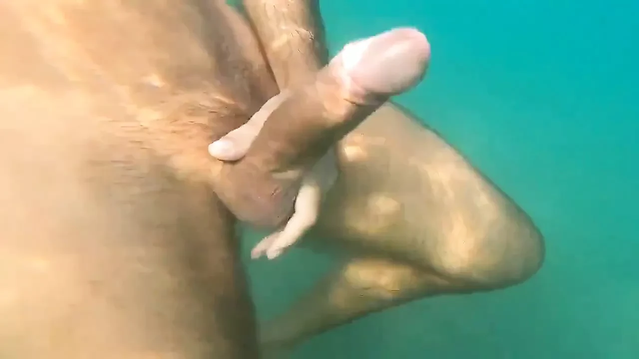 guy jerking off in the water