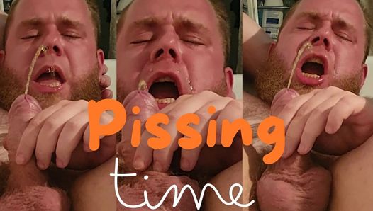 Hairy bear enjoys having piss injected into his mouth