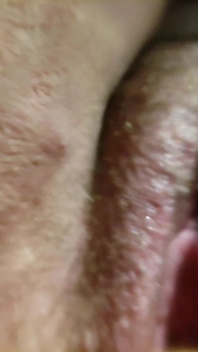 Hairy pussy riding a dildo