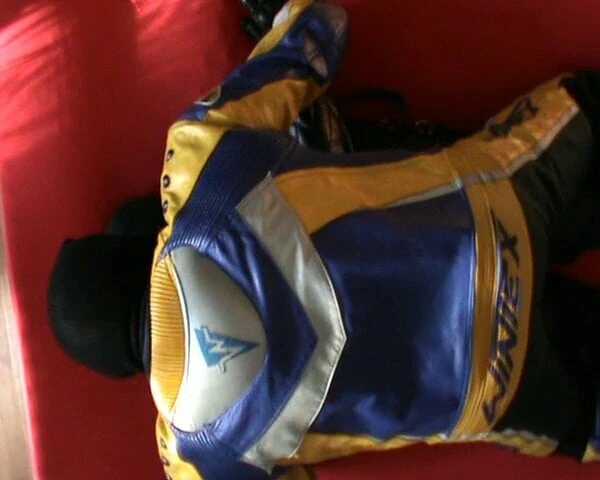 The biker on the straitjacketed slave