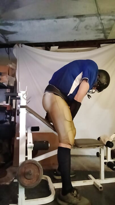 Nogometni sportaš se rasteže