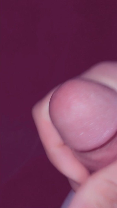 man plays with his penis