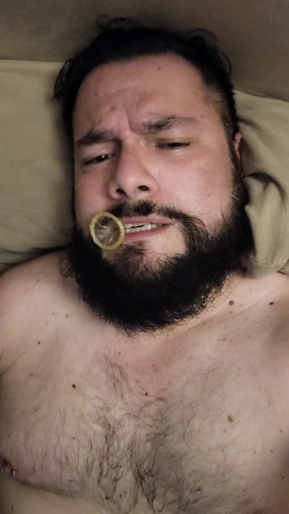 MASTURBATING WITH A CONDOM IN MY MOUTH