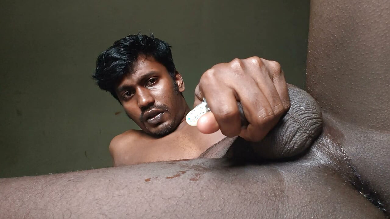 Pissing , fingering, jerking, cumming with condom and playing with my balls