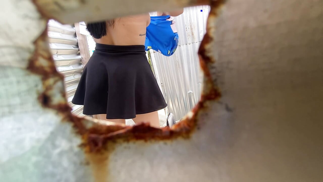 Camera in beach booth shows big ass and voluptuous Latina