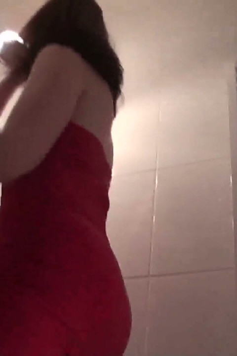 Pointed heels crushing human doormat in the bathroom