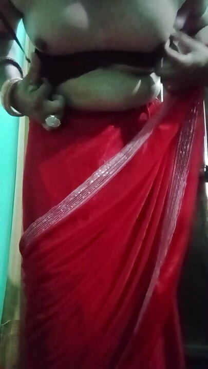 Indian Gay Crossdresser Bottom Gaurisissy Pressing Her Big Boobs and Feeling Horny in Red Saree with Heavy Jwellery