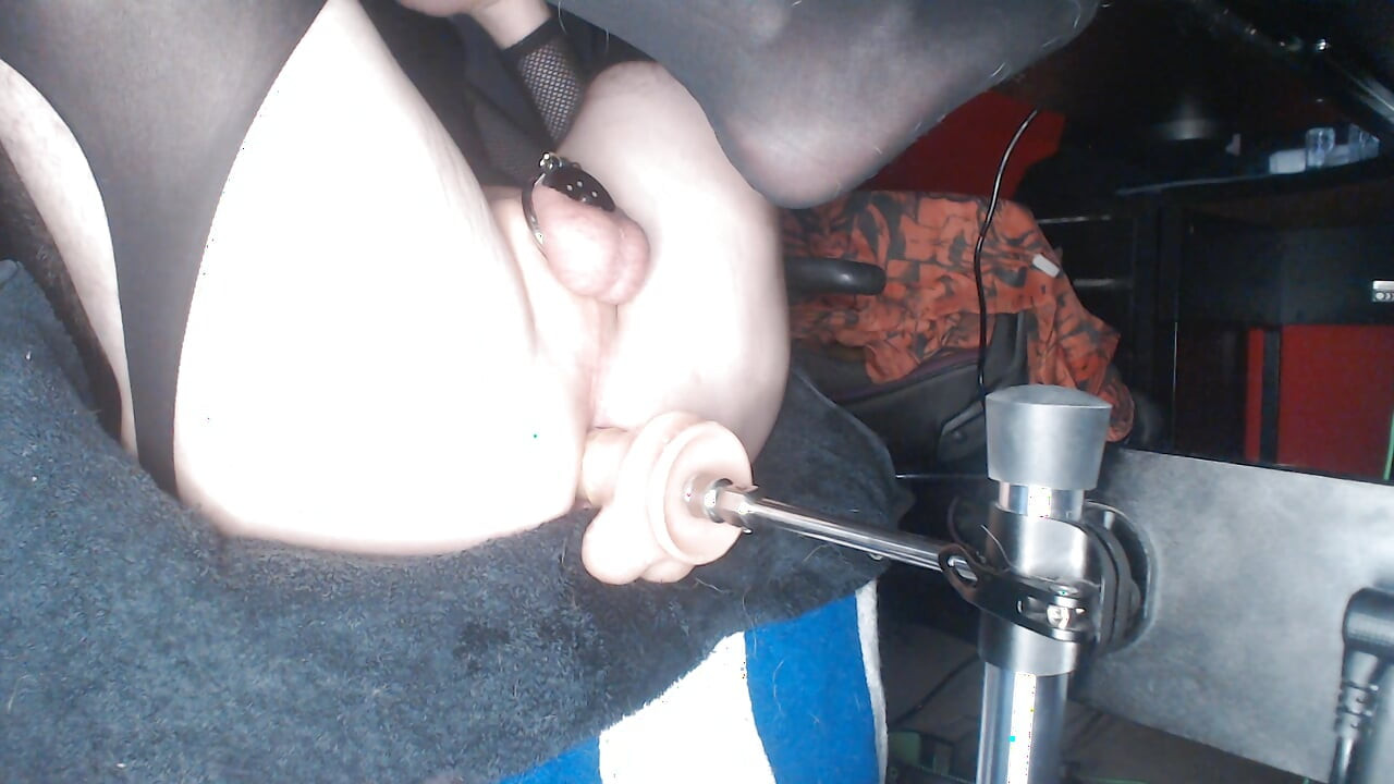 Caged sissy fails fucking machine sync