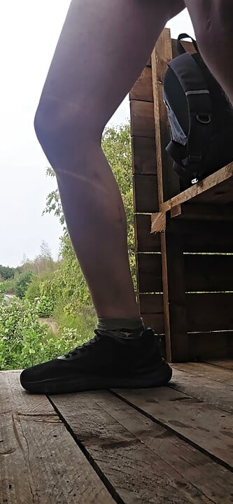 Riding a big dildo on a high seat in the forest