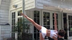 Kate Beckinsale doing yoga outdoors
