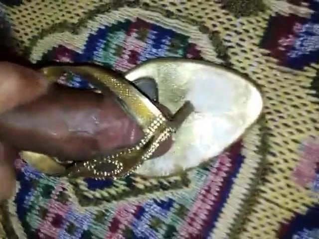 Cock on sandal