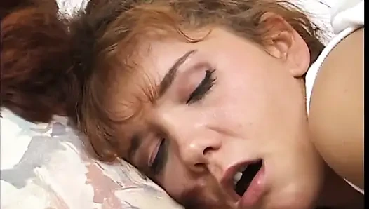 Redhead takes stiff cock in her ass