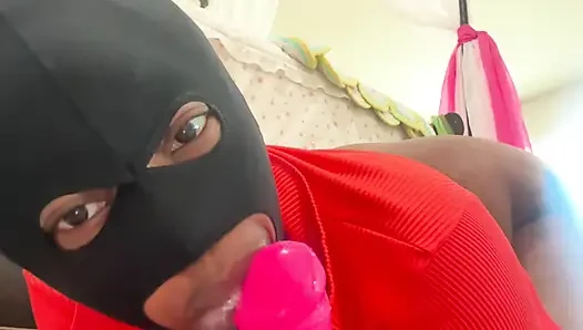 Busty Ebony in Mask Masturbates with a Huge Dildo