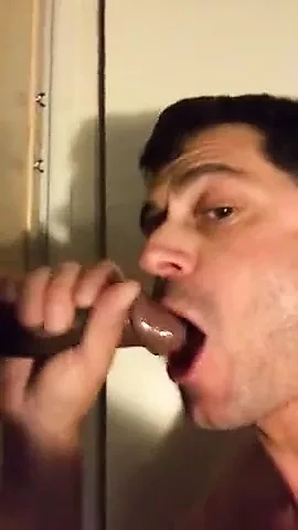 Sucking BBC at the glory hole with CIM and swallow