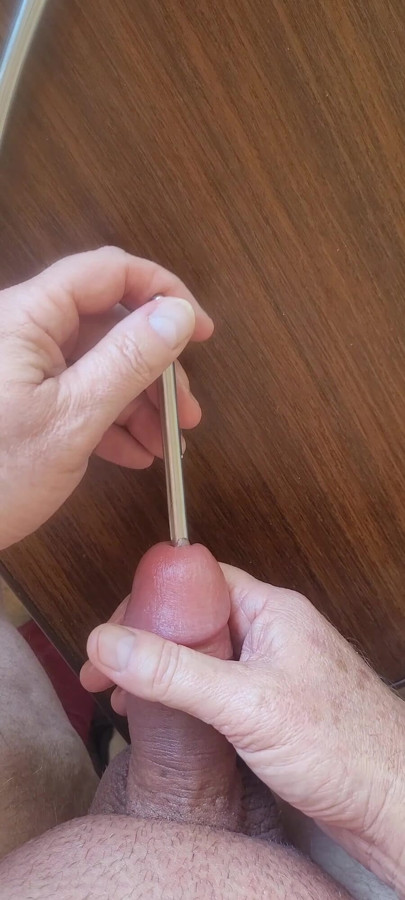 Masturbating my smooth cock with sounding rods before cumming
