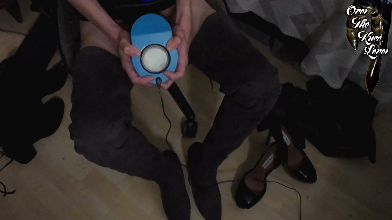 crossdresser autoblows in a leather dress and suede thigh high boots