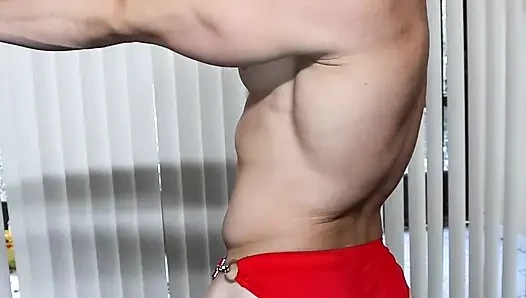 Hot sexy boy flexes to the camera his juicy muscles