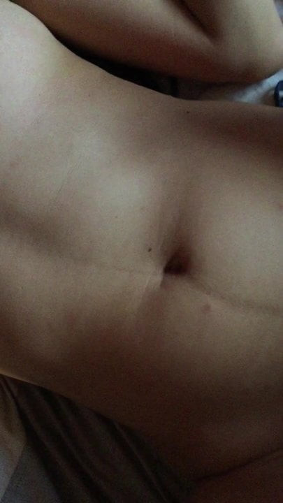 On her belly