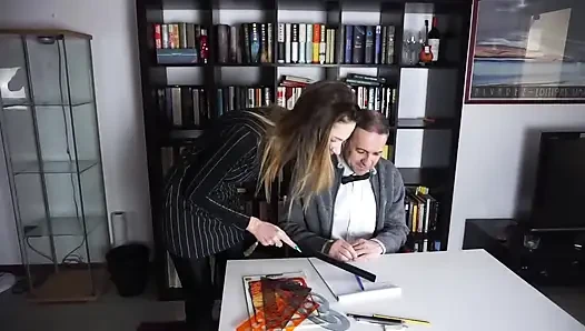 Femdom chick punishes her male slave in the office