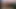 レズビアンが革のソファでくつろいで舐める