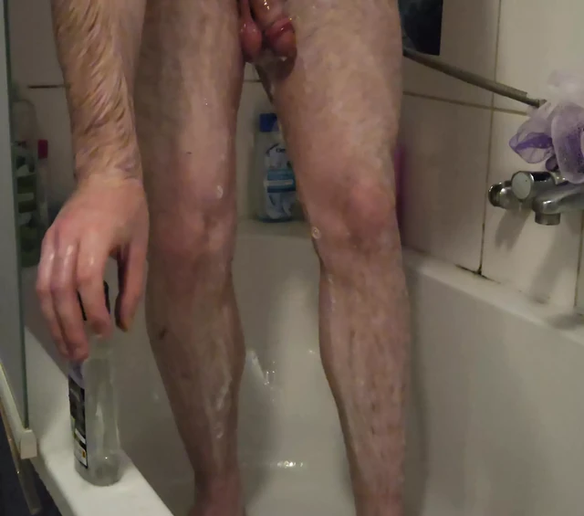 Young man in the shower