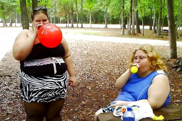 2 bbws are balloon blowing and popping