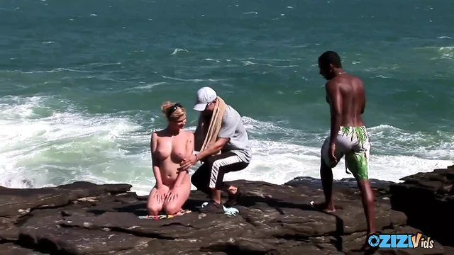 Busty blonde invites strangers to stuff her hard by the sea