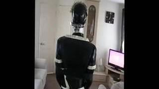 Slave rubber sissy doing chores