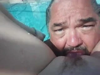 eating a fresh shaved pussy pool side