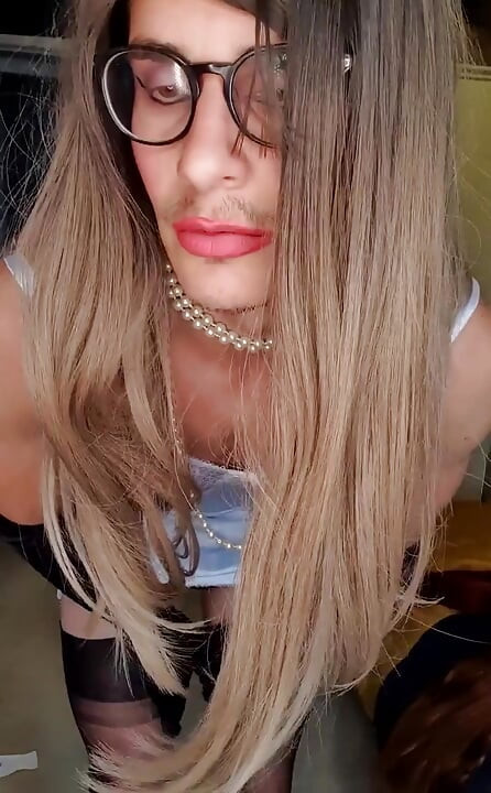 Mistress Jessica dressed up in a vintage white corselette