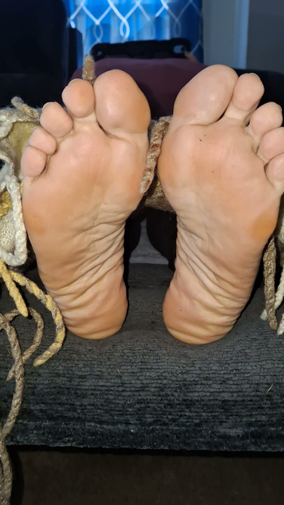 Peek a boo feet under the covers