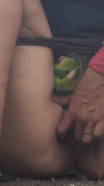 Captivating moment from "In the outdoor open field, my sister-in-law is urinating with fingers in her pussy, showing her"
