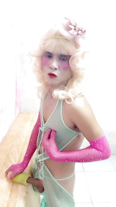 Oanh Le transgender wearing sexy clothes porn playing with an artificial can